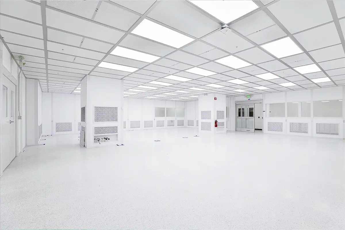 empty cleanroom space during construction showing finished walls and ceiling panels